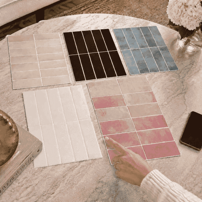 A range of Stick Tiles colours laid out on a table